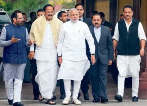 Prime Minister Narendra Modi, with his cabinet colleagues Venkaiah Naidu, Mukhtar Abbas Naqvi, Jitendra Singh and Rajiv Pratap Rudy, arrives to address the media duing the opening day of the winter session of Parliament in New Delhi on Monday. Photo by-Parveen Negi